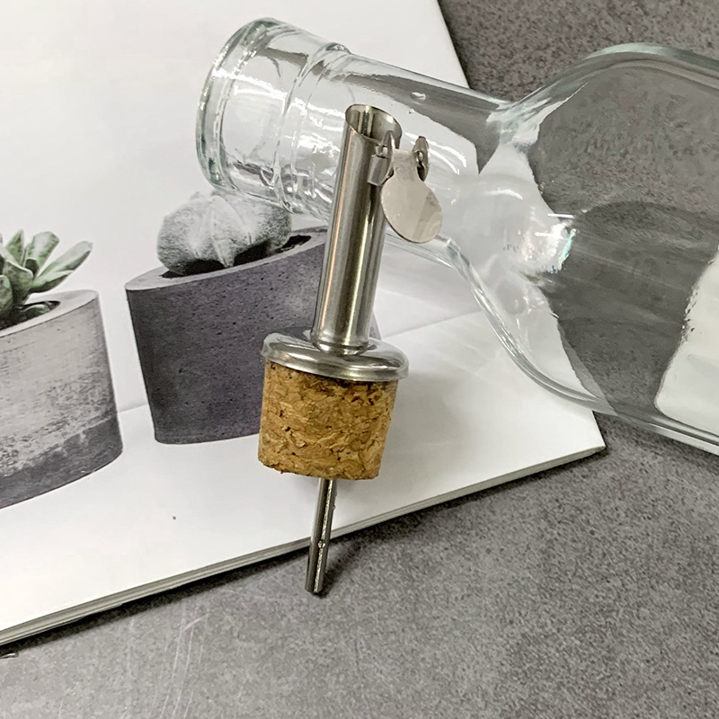 Stainless steel liquid pourer